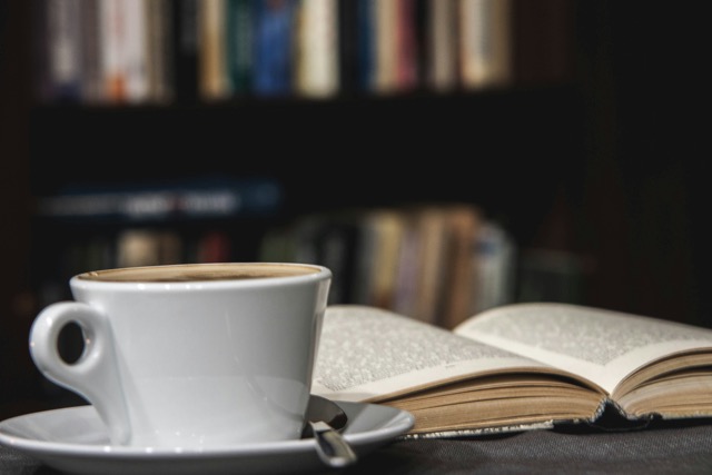 Book and a cup of coffee at a book cafe